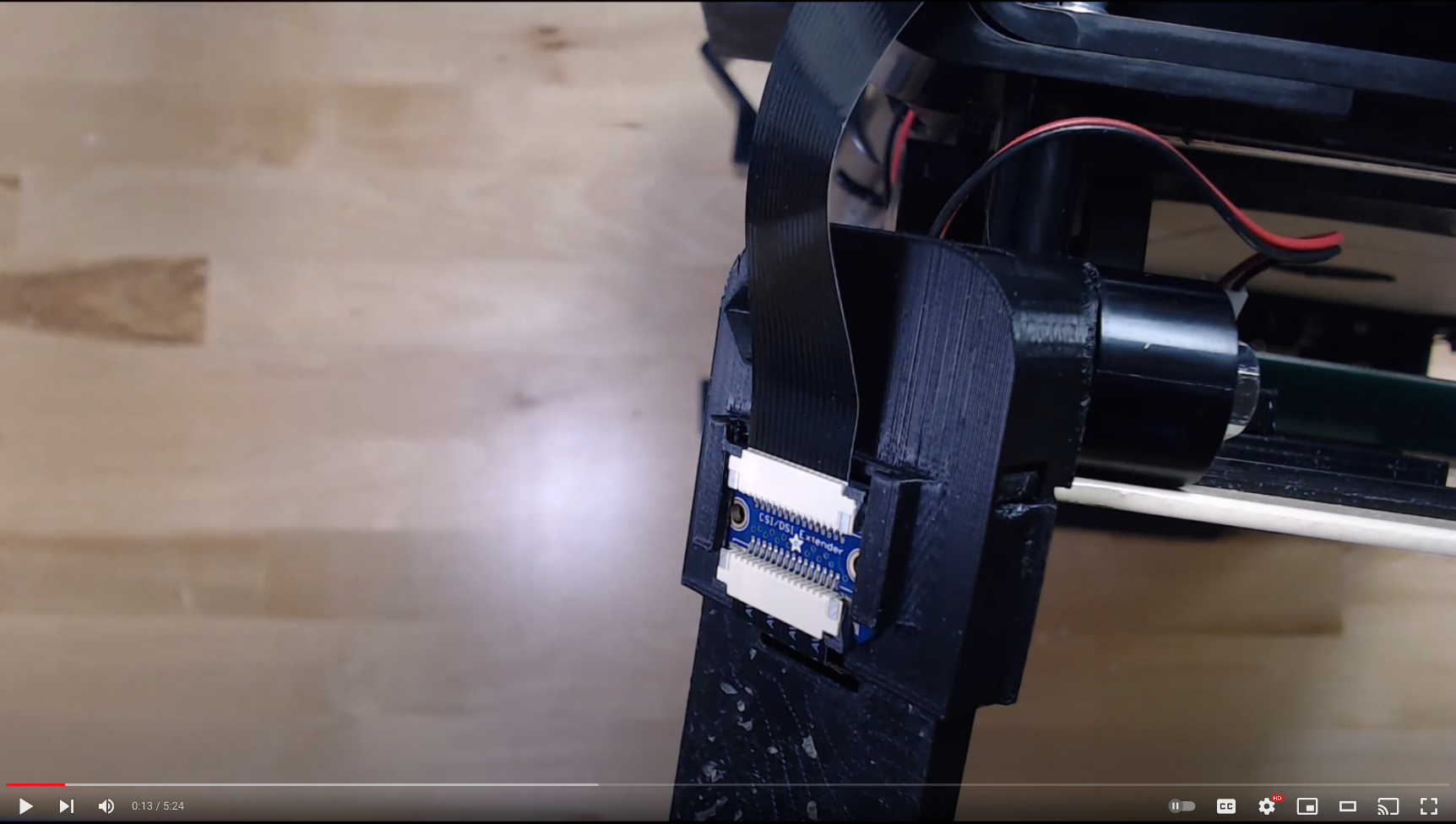 Replacing the NC Model's camera arm.